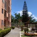 Quarto em Apartamento Mobiliado em Condomínio